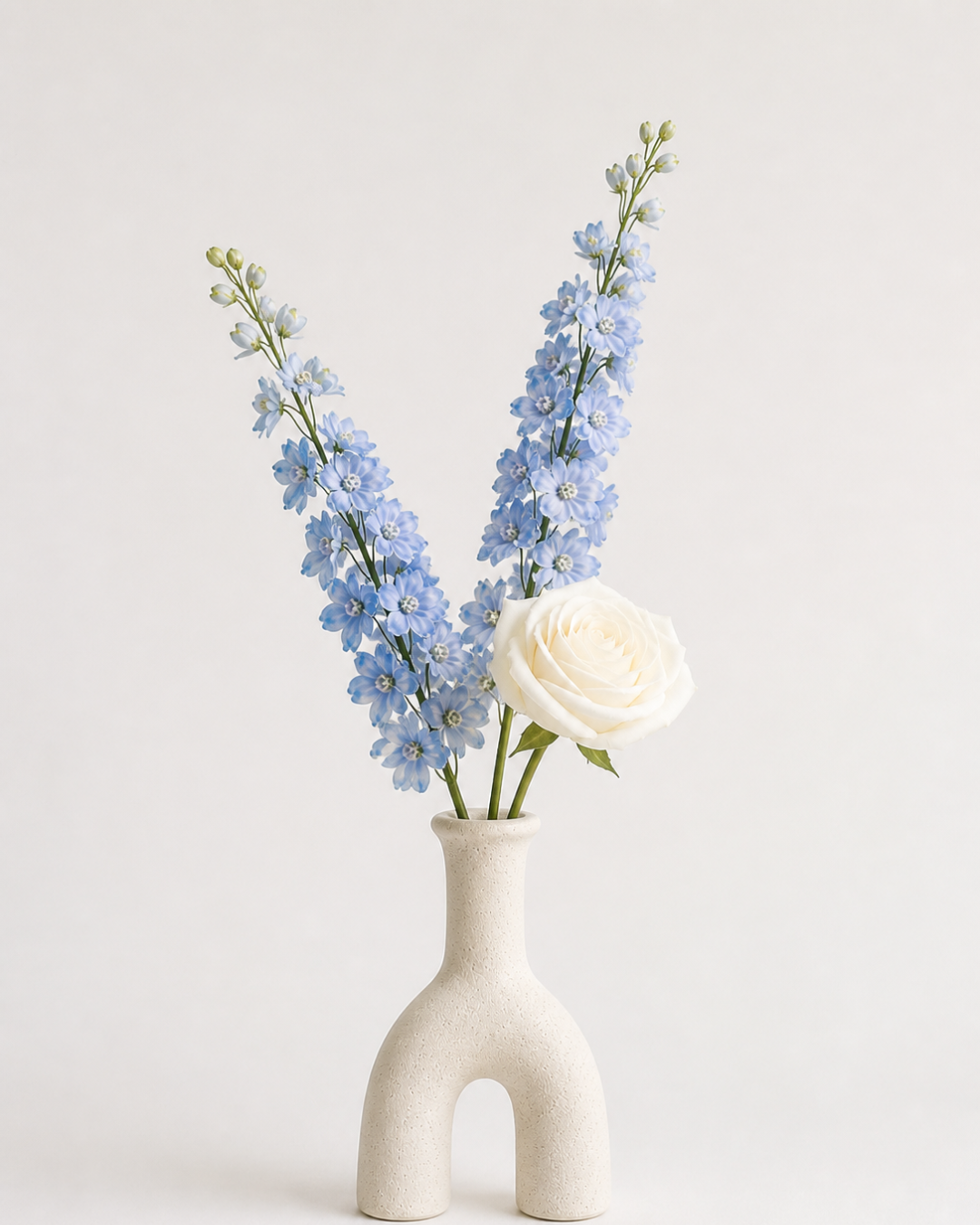 Blue Floral Stem Arrangement with Ceramic Vase to Hire